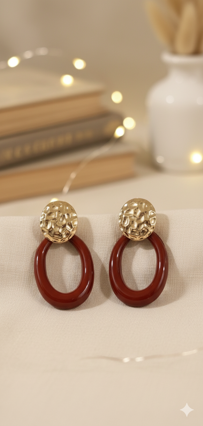 Beautiful ear hanging maroon and gold toned